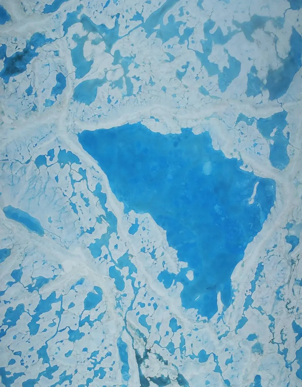 Meltwater over sea ice in the Beaufort Sea, photographed by NASA on July 14, 2016
