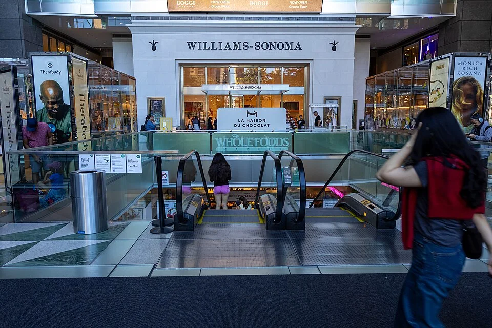 Escalators leading toward the Whole Foods Market at the Shops at Columbus Circle in New York.