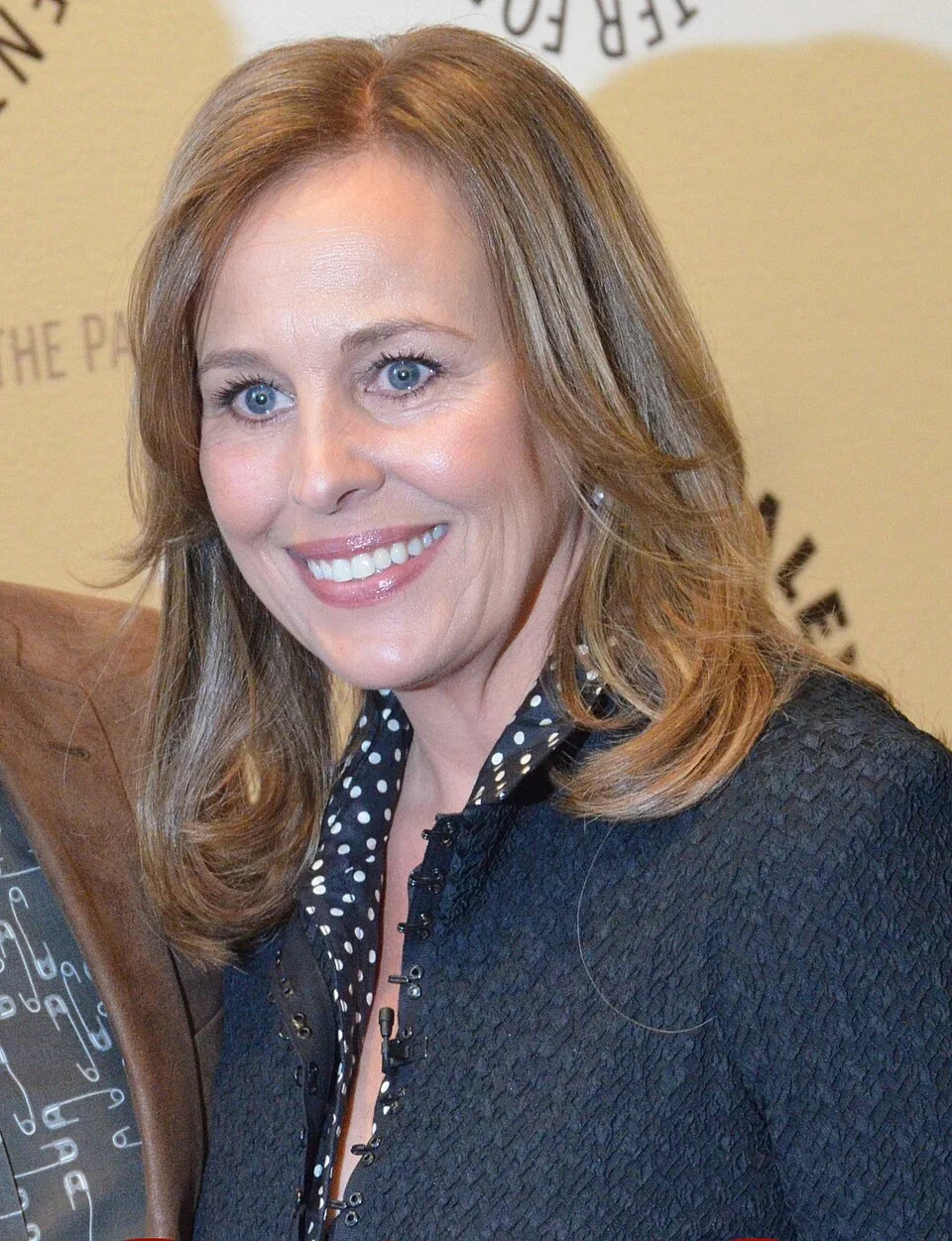 Genie Francis smiling in an archival April 2013 photograph