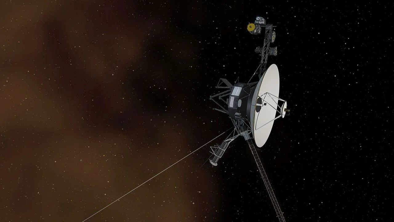 Illustration of the Voyager 1 spacecraft with its white dish antenna against a starfield and an orange glow of interstellar plasma